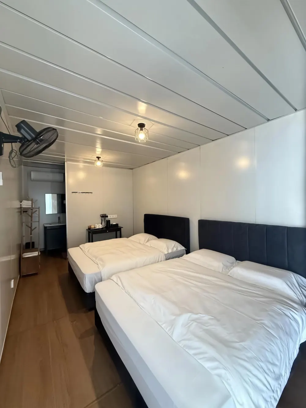 TDB Tioman Resort modern container room interior with two queen beds in Kampung Genting, Tioman Island