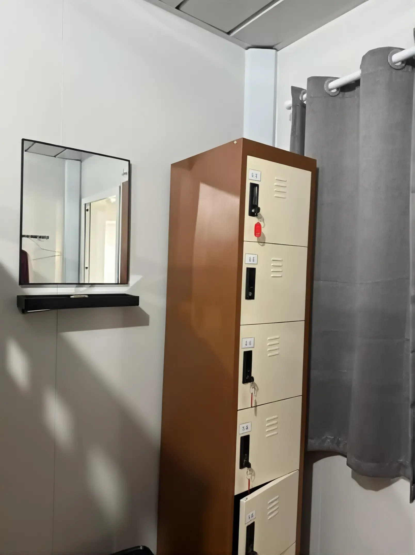 TDB Tioman Resort dorm room with secure lockers and privacy curtains