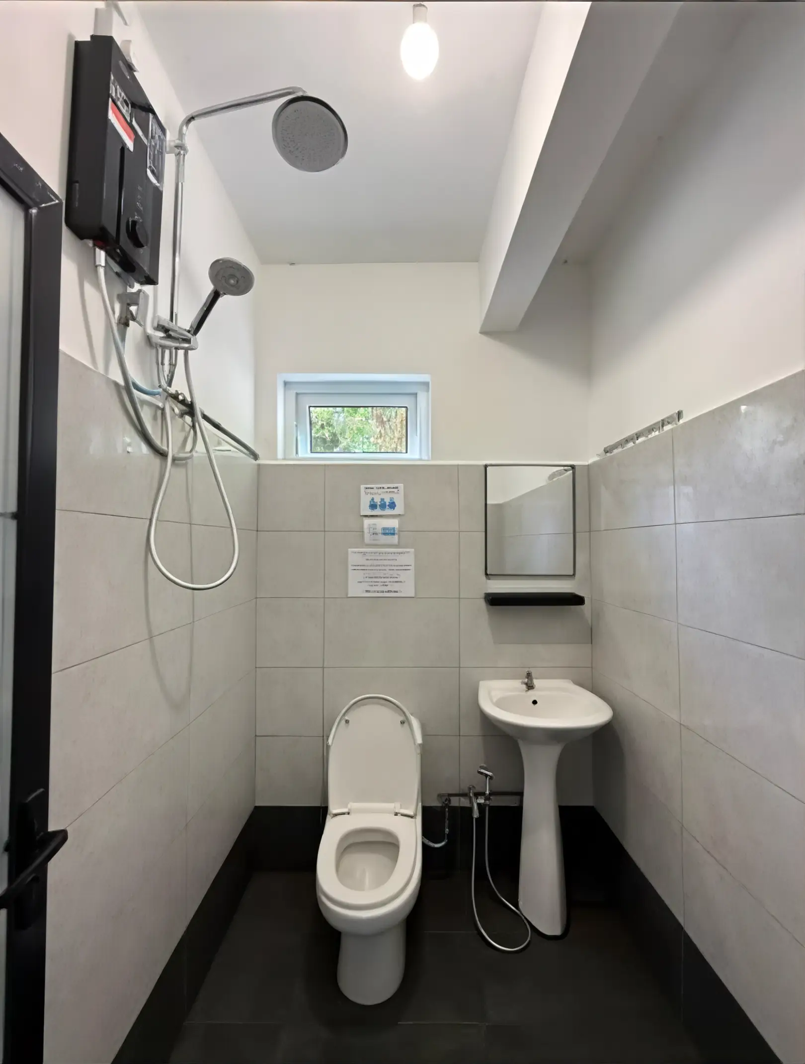 TDB Tioman Resort dorm shared bathroom with hot shower