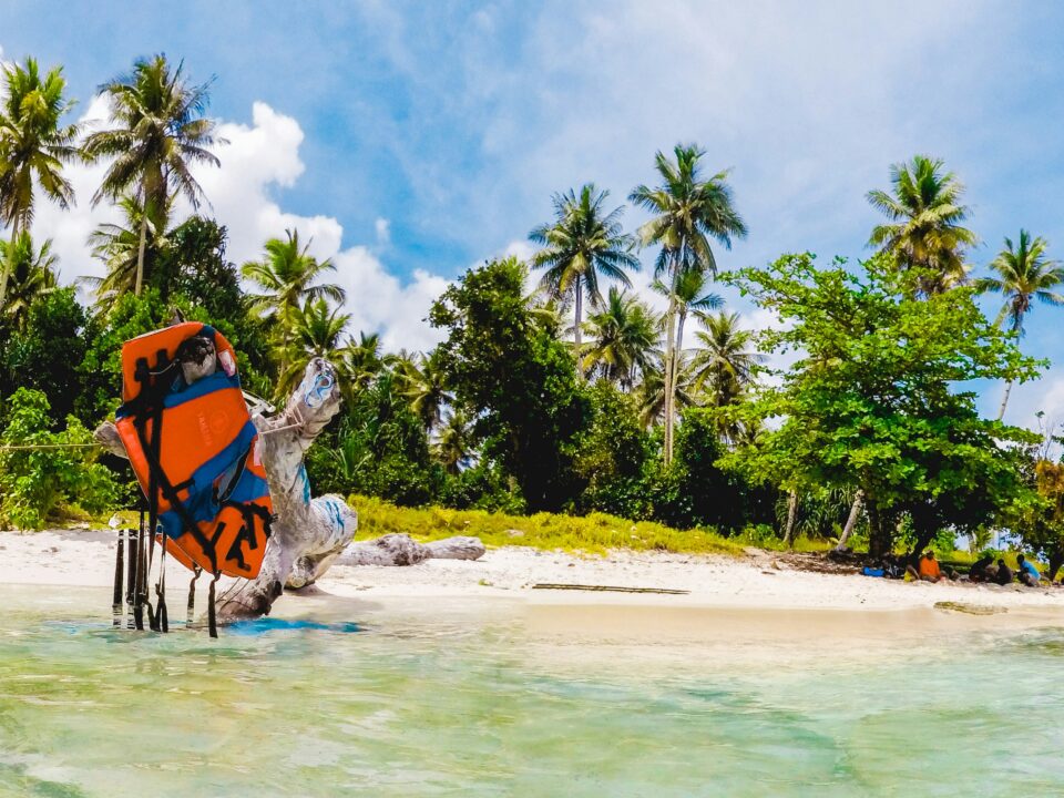 Solo traveler on a tropical island beach like Tioman
